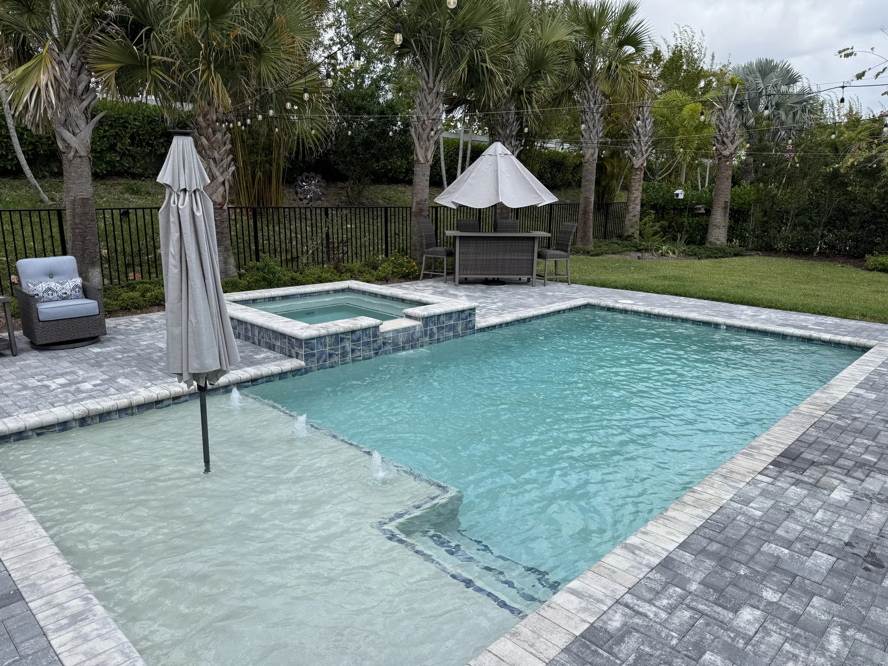 Spa and pool running in harmony — both balanced, both pristine