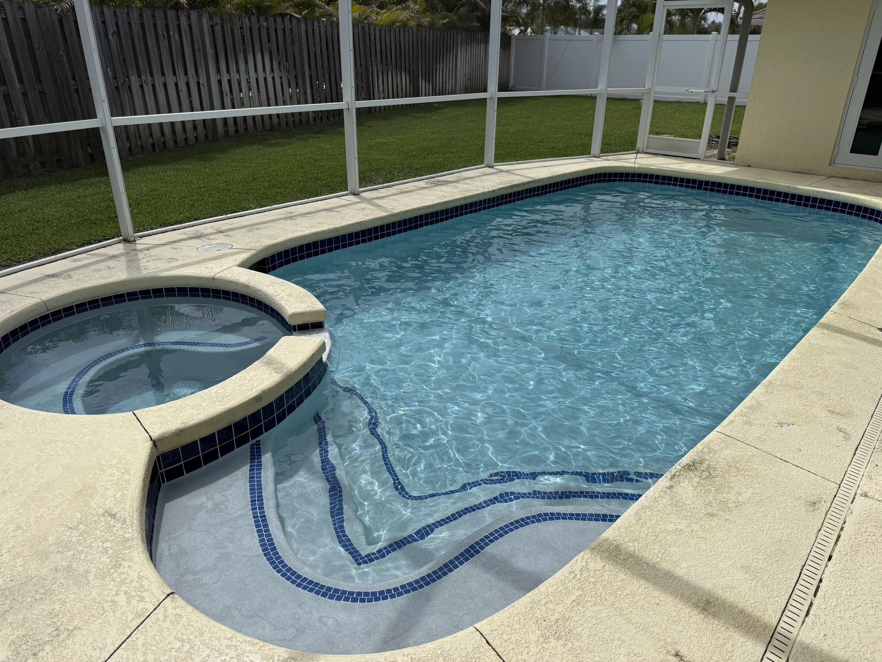 Pool, spa, and deck all finished — ready for guests
